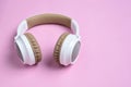 Close-up photo of cool headphone on pink background. Music concept Royalty Free Stock Photo