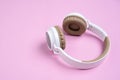 Close-up photo of cool headphone on pink background. Music concept Royalty Free Stock Photo