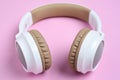 Close-up photo of cool headphone on pink background. Music concept Royalty Free Stock Photo