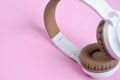 Close-up photo of cool headphone on pink background. Music concept Royalty Free Stock Photo