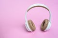 Close-up photo of cool headphone on pink background. Music concept Royalty Free Stock Photo