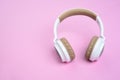 Close-up photo of cool headphone on pink background. Music concept Royalty Free Stock Photo