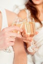 Close up photo of couple in love clinking glasses of champagne Royalty Free Stock Photo