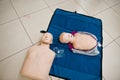 Close-up photo of CPR dolls or mannequins on the floor. Royalty Free Stock Photo