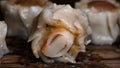 Close-up photo of crabstick dimsum on a bamboo plate