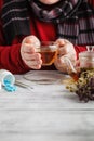 Close up photo of cup of tea, pills. sick man's treated