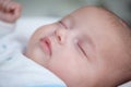 Close up photo of cute sleeping newborn baby, face Royalty Free Stock Photo