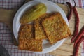 Close up photo of delicious Asian food, the Indoensian food gorengan: fried tempe or tempeh