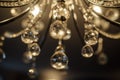 close up photo of of the details of a crystal chandelier in a hall