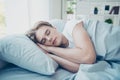 Close up photo of dreamy calm man guy lying on bed sleeping in night have free time want relax rest from difficult day