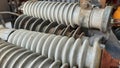 Close up photo of an electrical component called an Arrester which is neatly stacked. No people. selective focus