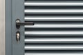 Close up photo of entrance door with a metal handle and keys Royalty Free Stock Photo