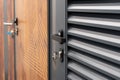 Close up photo of entrance door with a metal handle and keys Royalty Free Stock Photo