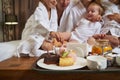 Close-up photo of family having breakfast in the hotel Royalty Free Stock Photo