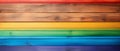 Close-Up of a Rainbow Colored Wooden Wall