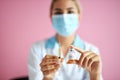 Close-up photo of female doctor holding syringe with vaccine Royalty Free Stock Photo