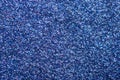 Close up photo flat lay flatlay image of foil bright blue glitter texture background