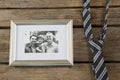 Close up of photo frame with necktie