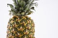 Close-up of fresh pineapple over white background
