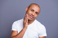 Close up photo glad dark skin he him his man strict expertising checking skin after shaving hand arm cheek cheekbone Royalty Free Stock Photo