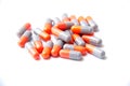 Close-up photo of Gray orange pills isolated on white background Royalty Free Stock Photo