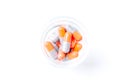 Close-up photo of Gray orange pills isolated on white background Royalty Free Stock Photo