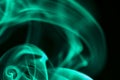 Green smoke on black background, smoky abstract background