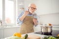 Close up photo grey haired he his him grandpa appetite waiting guests cooking favorite family dish trying taste wait Royalty Free Stock Photo