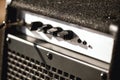 Close-up photo of guitar amplifier with cable audio jack Royalty Free Stock Photo