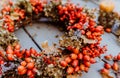 Close up photo of handmade colorful floral autumn door wreath Royalty Free Stock Photo