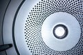 Close up photo of inside dryer machine drum Royalty Free Stock Photo