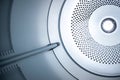 Close up photo of inside dryer machine drum Royalty Free Stock Photo