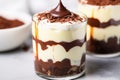 close-up photo of layered chocolate and vanilla pudding