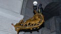 Close-up photo of a lion-shaped lantern, painted in gold, found inside the Marasesti mausoleum Royalty Free Stock Photo