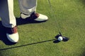 Close up photo of Man Putting Golf Ball Royalty Free Stock Photo