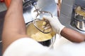 African chef cooking dough at the kitchen