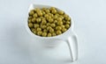 Close up photo of marinated olives in white bowl over white background Royalty Free Stock Photo