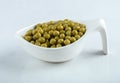 Close up photo of marinated olives in white bowl over white background Royalty Free Stock Photo