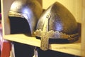 Close-up photo of medieval helmet , ancient warrior iron knight shining style . Concept of old vintage traditions , extreme fight