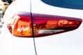 Close up photo of modern and clean car, detail of back light tail lights, modern luxury technology and auto detail