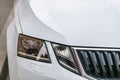 Close up photo of modern and clean car, detail of headlight. Headlight car Projector/LED of a modern luxury technology and auto Royalty Free Stock Photo