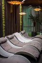 Close up photo of modern interior of spa center with loungers Royalty Free Stock Photo