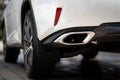 Close up photo of modern luxury sport car suv elegant design mufflers tailpipe. Royalty Free Stock Photo