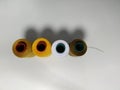 Colorful Spools of Sewing Thread on White Background Royalty Free Stock Photo
