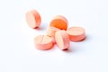 Close-up photo of orange pills isolated on white background Royalty Free Stock Photo