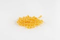 Close-up photo of pasta Farfalline on white background Royalty Free Stock Photo