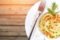 Close-up photo of pasta with prawns and cheese in