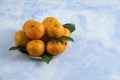 Close up photo Pile of mandarins with leaves