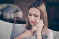 Close-up photo portrait of sad crying she her lady holding white paper tissue in hand closing eyes Royalty Free Stock Photo