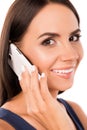 Close up photo of pretty woman talking on the mobile phone Royalty Free Stock Photo